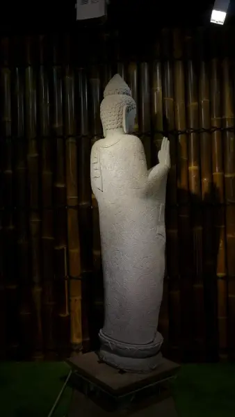 Product image 8 of the product “Standing Buddha with floral carving, Abudaya position. 43 x 39 x 175cm. Natural stone (river stone), stonemasonry ”